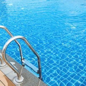 sunshine on swimming pool sunshine and clear water of swimming pool